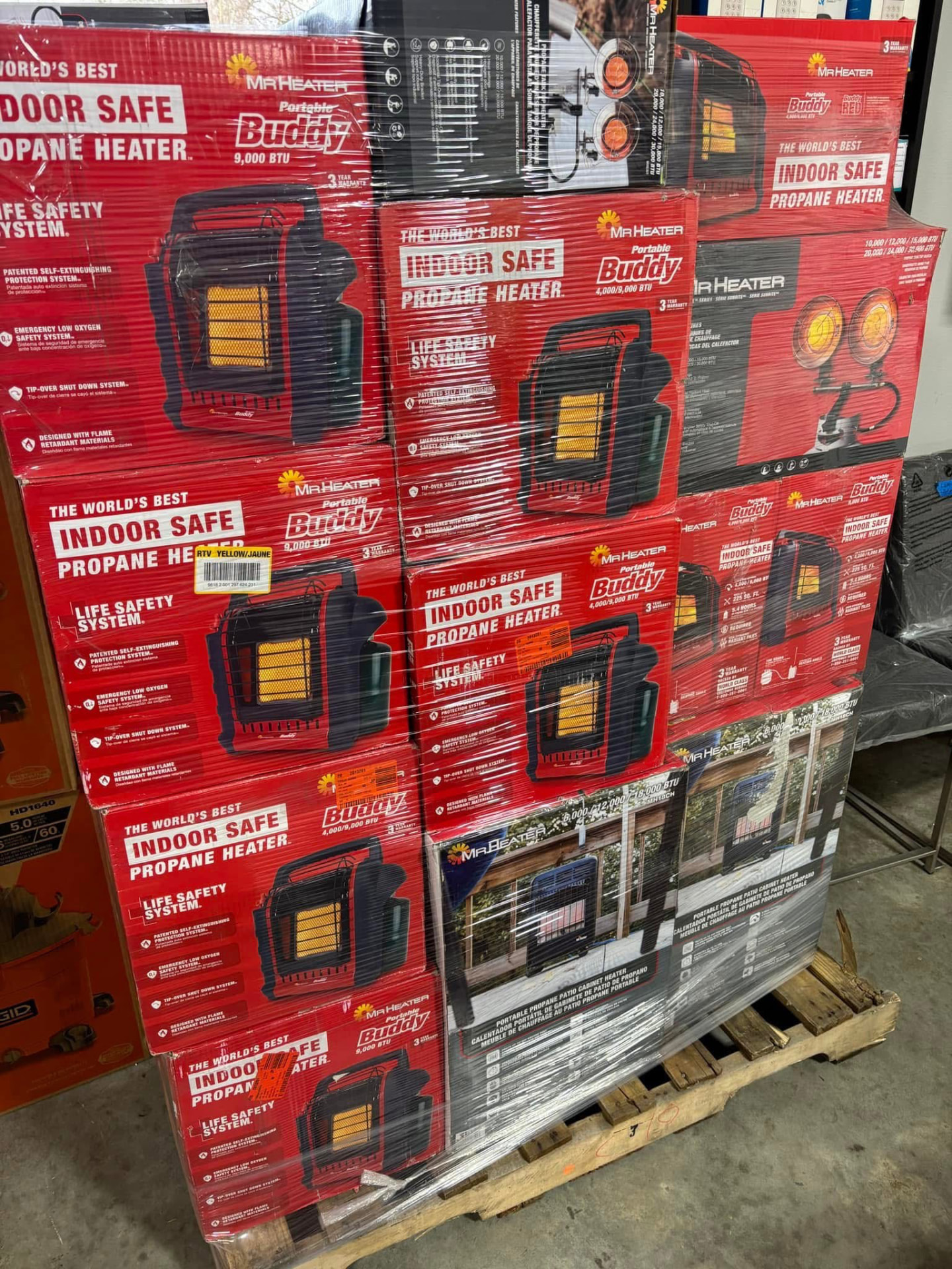 Pallet stacked with boxed Mr. Heater Portable Buddy indoor-safe propane heaters
