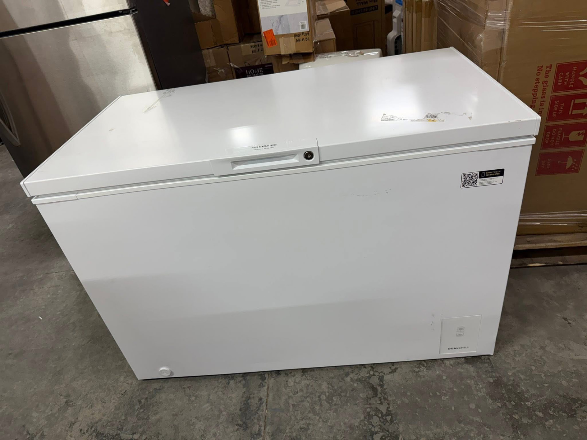 New white Frigidaire chest freezer on the warehouse floor at Austin's Home Supply & More